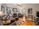 Cozy living room with hardwood floors and fireplace at 303 Edgewood Rd, Shelby, NC 28150