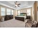 Spacious primary bedroom with ample natural light and room for large furniture at 3205 Helmsley Ct, Concord, NC 28027