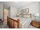 Bright bedroom with king-size bed and access to a hallway at 3205 Helmsley Ct, Concord, NC 28027