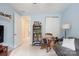 Bonus room with bookcase and rocking chair at 3205 Helmsley Ct, Concord, NC 28027