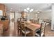 Spacious dining area with hardwood floors and access to kitchen at 3205 Helmsley Ct, Concord, NC 28027