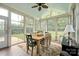 Bright sunroom with plenty of windows and a dining area at 3205 Helmsley Ct, Concord, NC 28027