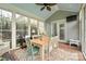 Spacious sunroom with dining area and access to backyard at 3205 Helmsley Ct, Concord, NC 28027