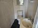 Small bathroom with white toilet and sink at 3219 Sutton Dr, Charlotte, NC 28216