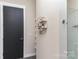 Modern bathroom with walk-in shower and decorative shelving at 3630 N Davidson St # 4406, Charlotte, NC 28205