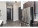 Modern kitchen featuring stainless steel appliances and sleek gray cabinets at 3630 N Davidson St # 4406, Charlotte, NC 28205