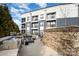 Exterior patio featuring an outdoor kitchen with a grill and a firepit seating area at 3630 N Davidson St # 4406, Charlotte, NC 28205