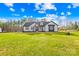 Beautiful home with a manicured lawn and a modern farmhouse design at 4011 Brandy Creek Ct, Clover, SC 29710