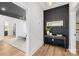 Hallway view features decorative dark wall paneling and bedroom access at 4011 Brandy Creek Ct, Clover, SC 29710