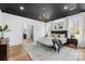 Stylish main bedroom features a dark ceiling, decorative chandelier and an ensuite bathroom at 4011 Brandy Creek Ct, Clover, SC 29710