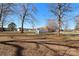 Backyard view of house with fence and trees at 416 Delview Dr, Cherryville, NC 28021