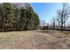 Spacious backyard with detached shop and fenced area at 416 Delview Dr, Cherryville, NC 28021