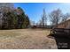 Spacious backyard with shed and wooden deck at 416 Delview Dr, Cherryville, NC 28021