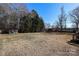 Large backyard with shed and wooden deck at 416 Delview Dr, Cherryville, NC 28021