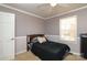 Small bedroom with a full-size bed and ceiling fan at 416 Delview Dr, Cherryville, NC 28021