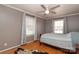 Bright bedroom with hardwood floors and ceiling fan at 416 Delview Dr, Cherryville, NC 28021