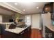 Modern kitchen with dark cabinetry, granite island, and stainless steel appliances at 416 Delview Dr, Cherryville, NC 28021