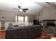 Living room with hardwood floors, vaulted ceiling and fireplace at 416 Delview Dr, Cherryville, NC 28021