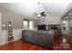 Spacious living room with hardwood floors and stone fireplace at 416 Delview Dr, Cherryville, NC 28021