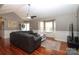 Open living room with hardwood floors, kitchen view at 416 Delview Dr, Cherryville, NC 28021