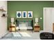 Modern Bedroom with green walls and a black crib at 4491 Potters Wheel Dr, Fort Mill, SC 29715