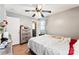 Spacious bedroom with hardwood floors, a ceiling fan, and natural light at 453 Bynum Ave, Rock Hill, SC 29732