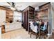 Cozy dining room with tile floors, wood paneled walls, and natural light, perfect for Gathering meals at 453 Bynum Ave, Rock Hill, SC 29732