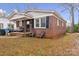 Charming brick home with a covered front porch and classic black shutters at 453 Bynum Ave, Rock Hill, SC 29732