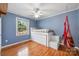 Hardwood floors, light blue walls, and hanging chair at 513 Paradise Cir, Belmont, NC 28012