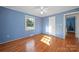 Hardwood floors, light blue walls, and a window at 513 Paradise Cir, Belmont, NC 28012