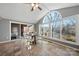 Bright dining area with water views and access to deck at 513 Paradise Cir, Belmont, NC 28012