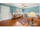 Bright living room with hardwood floors, comfy seating, and a view to the kitchen at 513 Paradise Cir, Belmont, NC 28012