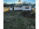 Large backyard with grassy area and a white house at 516 Washington St, Cramerton, NC 28032