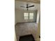 Spacious bedroom with carpeted floors and ceiling fan at 516 Washington St, Cramerton, NC 28032