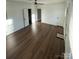 Bright living room featuring hardwood floors and multiple entries at 516 Washington St, Cramerton, NC 28032