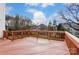 A spacious wooden deck overlooks the backyard, perfect for outdoor entertaining at 561 Ambergate Nw Pl, Concord, NC 28027