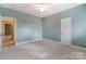 Spacious bedroom showcasing a neutral color palette and comfortable carpeting at 561 Ambergate Nw Pl, Concord, NC 28027