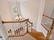 Elegant foyer from staircase landing features hardwood floors, chandelier and abundant natural light at 6042 Legacy Cir, Charlotte, NC 28277