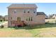 Brick home with deck and fenced backyard at 6361 Willow Farm Dr, Denver, NC 28037