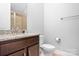 Clean bathroom with granite countertop and tiled shower at 6361 Willow Farm Dr, Denver, NC 28037