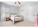 Charming bedroom with metal bed frame and neutral decor at 6361 Willow Farm Dr, Denver, NC 28037