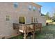 Wooden deck overlooks fenced backyard at 6361 Willow Farm Dr, Denver, NC 28037