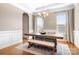 Formal dining room featuring hardwood floors and a farmhouse table at 6361 Willow Farm Dr, Denver, NC 28037