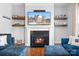 Elegant fireplace with built-in shelving at 6361 Willow Farm Dr, Denver, NC 28037