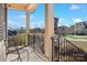 Relaxing front porch with wrought iron railings and neighborhood view at 6361 Willow Farm Dr, Denver, NC 28037