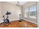 Bright home office with hardwood floors and exercise equipment at 6361 Willow Farm Dr, Denver, NC 28037