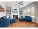 Bright living room featuring fireplace and hardwood floors at 6361 Willow Farm Dr, Denver, NC 28037