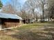 Large backyard with detached garage and shed in view at 649 Arch Dr, Rock Hill, SC 29730