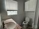 Bathroom with granite vanity and updated toilet at 649 Arch Dr, Rock Hill, SC 29730