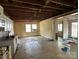 Kitchen with white cabinets and tiled floor, undergoing renovation at 649 Arch Dr, Rock Hill, SC 29730